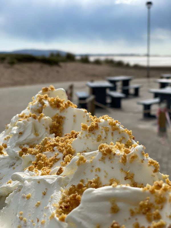 gelato_outside_llanelli_beach_portrait freshly made gelato overlooking llanelli beach carmarthenshire